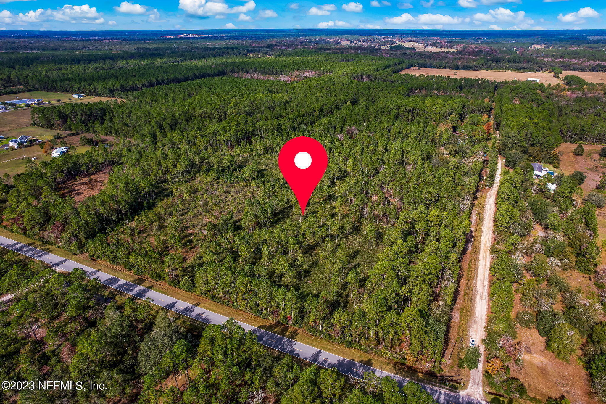 0 Unassigned Address Interlachen, FL 32148 - Photo 35 of 35 a view of a yard with a lake