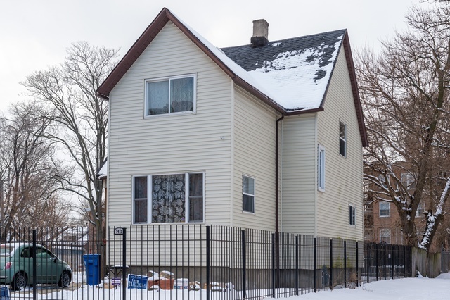 a view of a house with a large windows