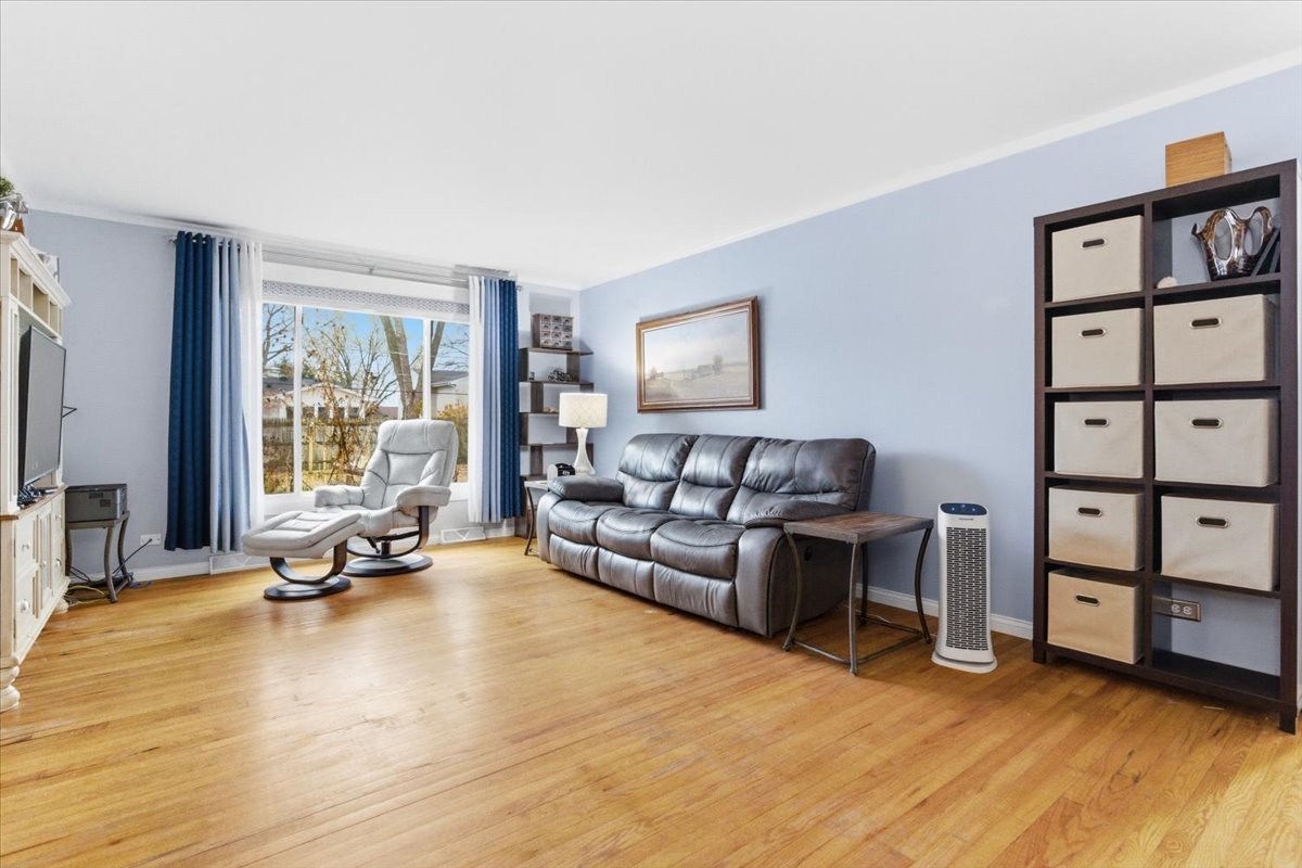 2105 Sprucewood Lane Lindenhurst, IL 60046 - Photo 5 of 37 a living room with furniture and a large window