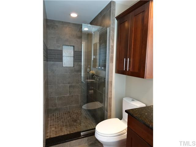413 Kenwood Court Raleigh, NC 27609 - Photo 16 of 19 Step in and wash all your cares away in this breath taking shower. Master Bath/Spa