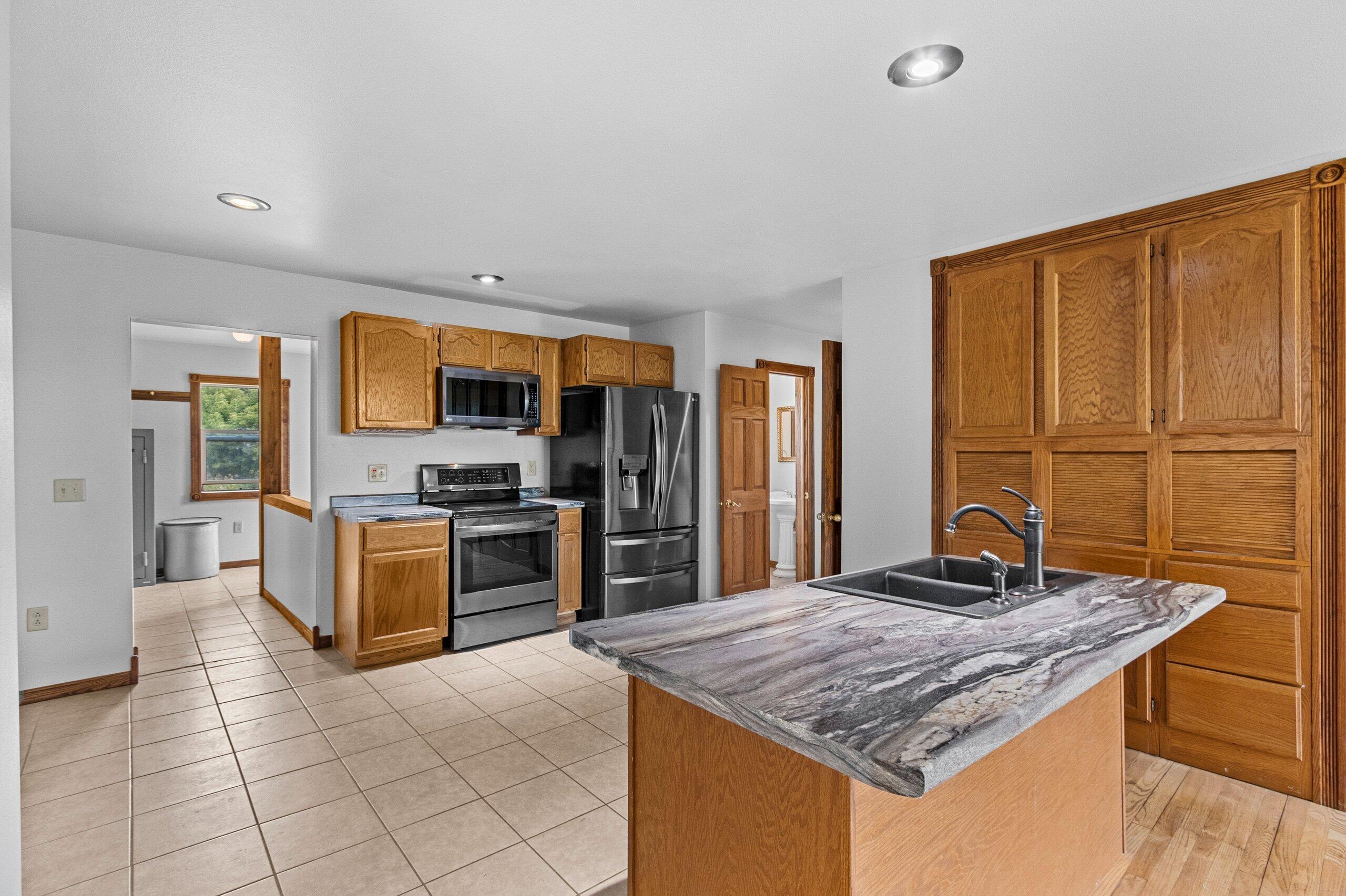 W3966 32nd Road Carney, MI 49812 - Photo 12 of 77 Kitchen & Island