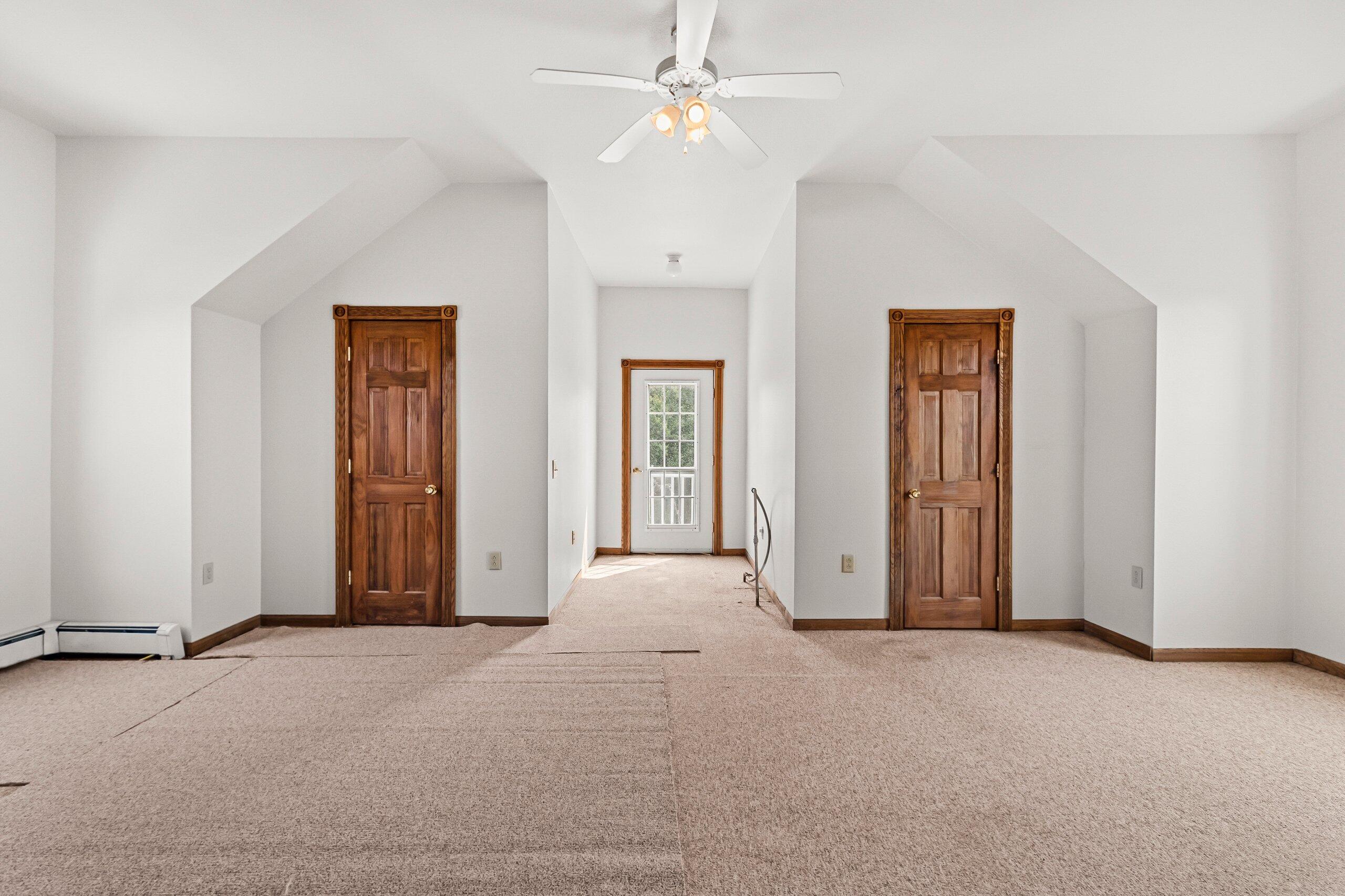 W3966 32nd Road Carney, MI 49812 - Photo 38 of 77 2nd Floor BR with dual closets and balcony