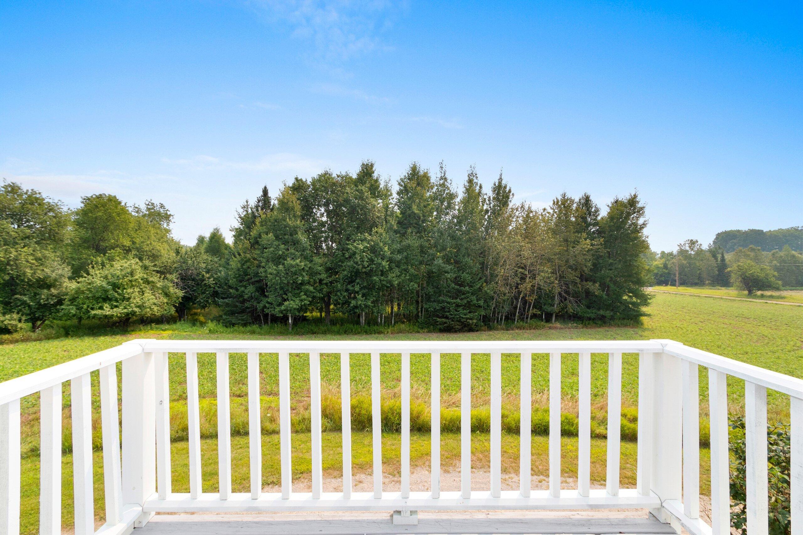 W3966 32nd Road Carney, MI 49812 - Photo 40 of 77 2nd floor Porch (2) Balcony