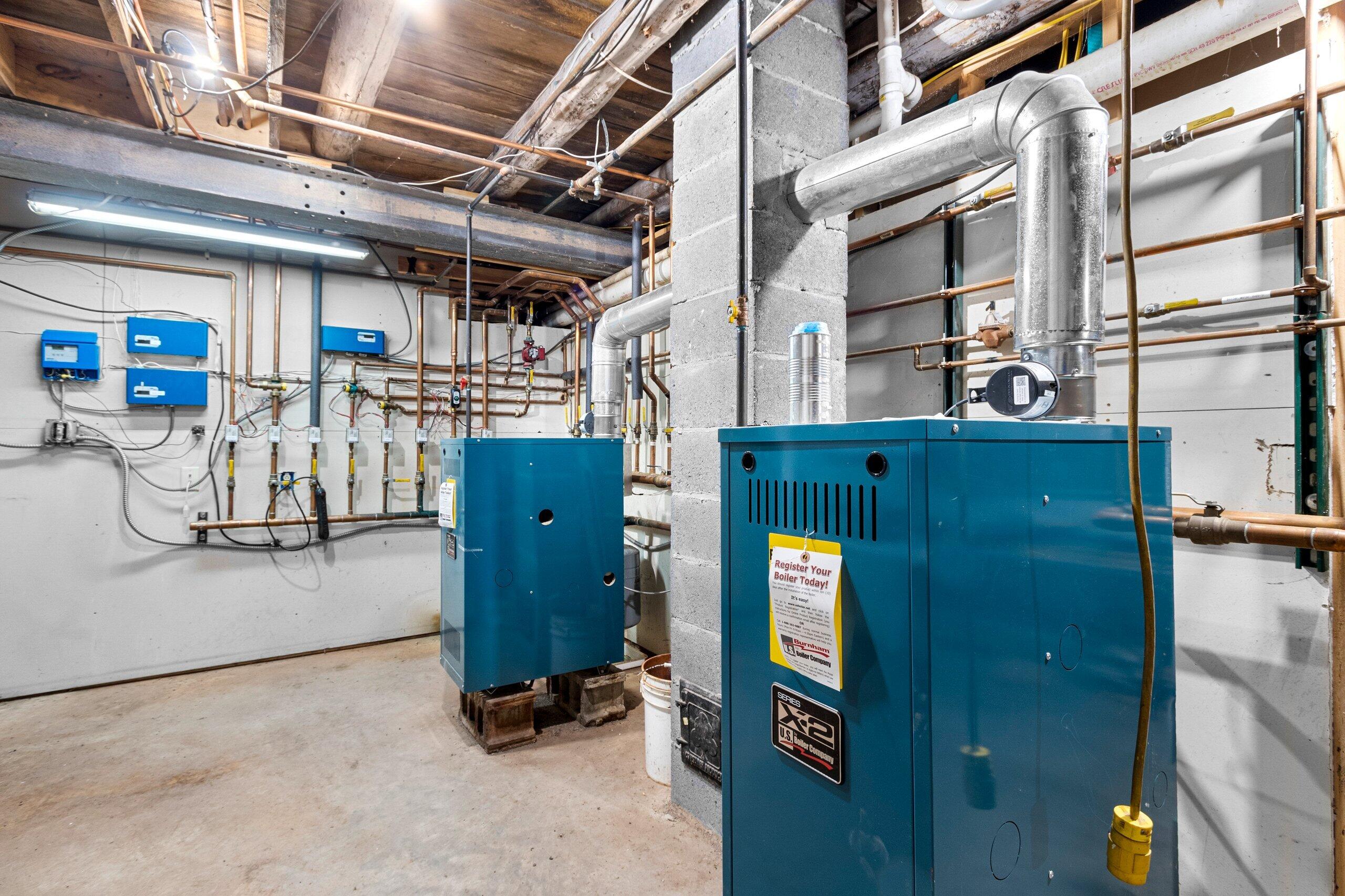 W3966 32nd Road Carney, MI 49812 - Photo 51 of 77 Mechanical Area Lower~ 2 Boilers