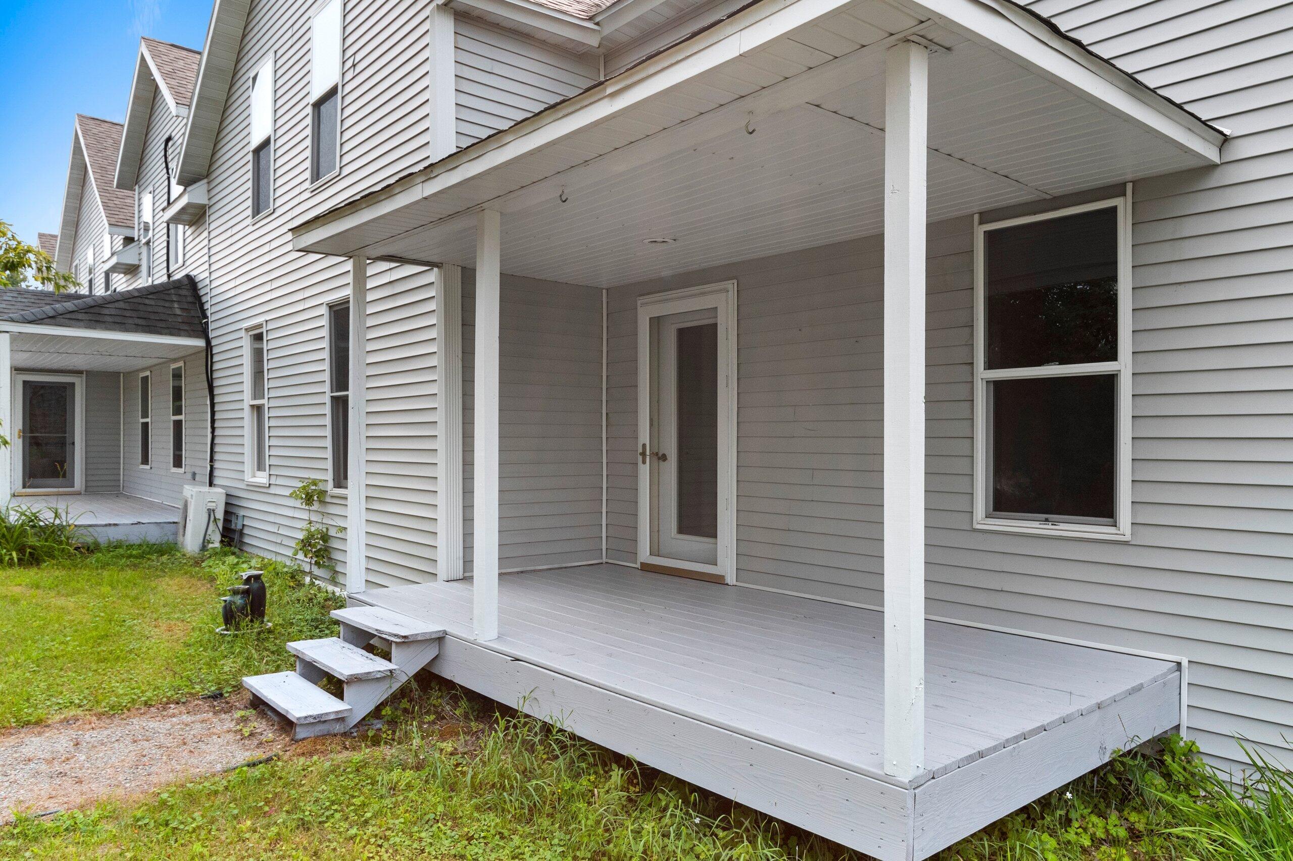 W3966 32nd Road Carney, MI 49812 - Photo 69 of 77 1st Back Corner Porch (3) with separate entrance to lower BR