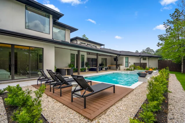 a front view of house with yard outdoor seating and green space
