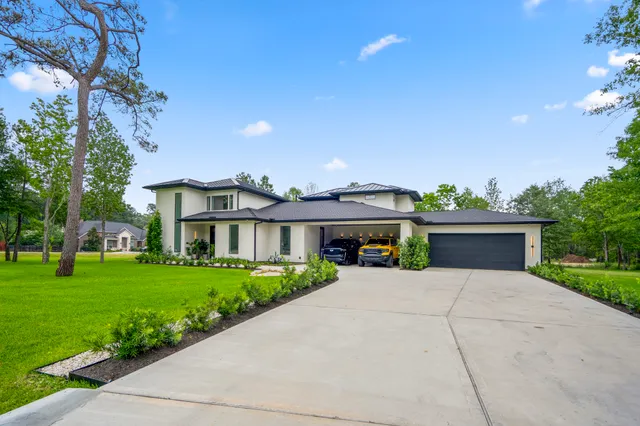 aerial view of a house with a yard