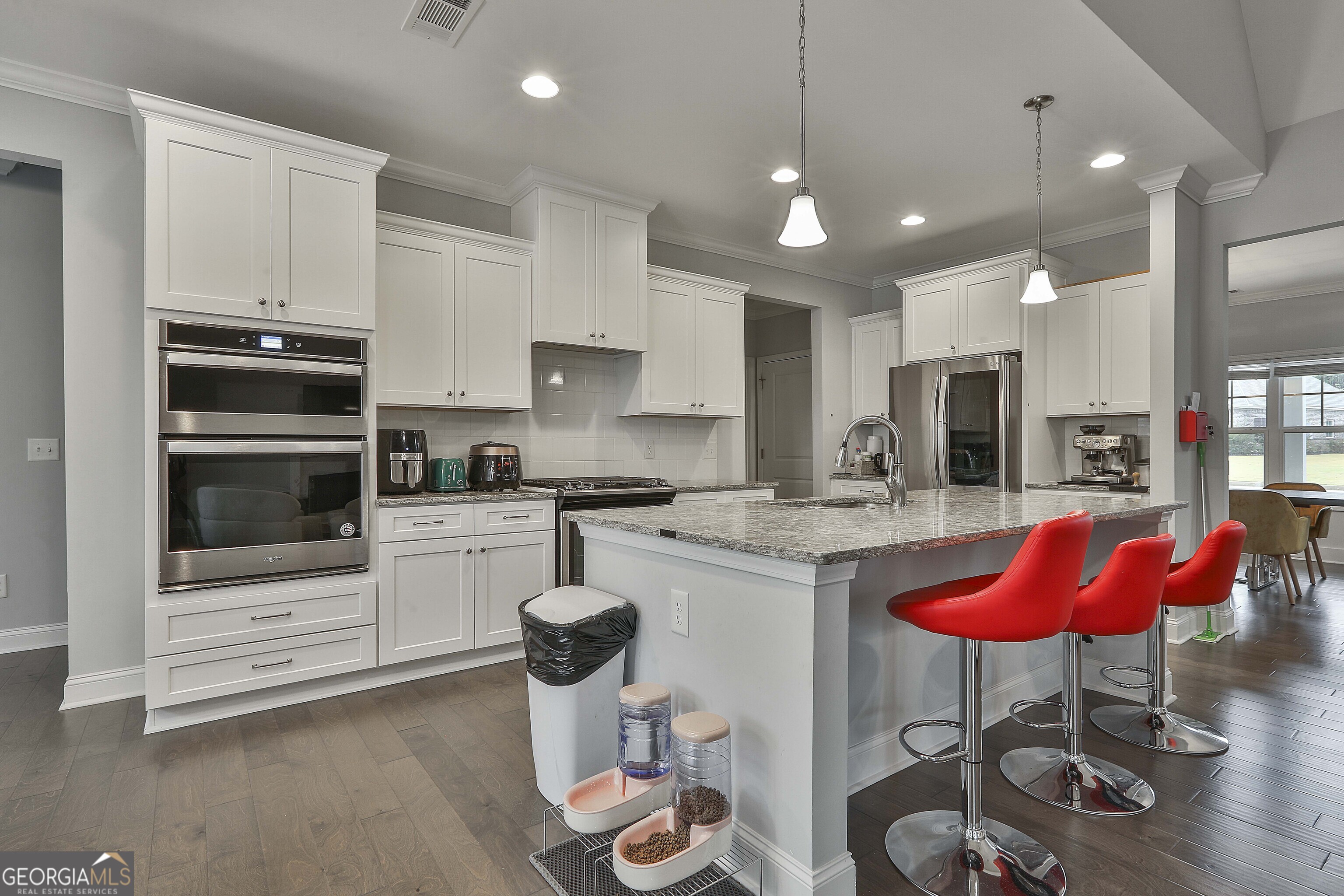 405 Lakeview Way LaGrange, GA 30241 - Photo 16 of 54 a kitchen with stainless steel appliances kitchen island granite countertop a sink and cabinets