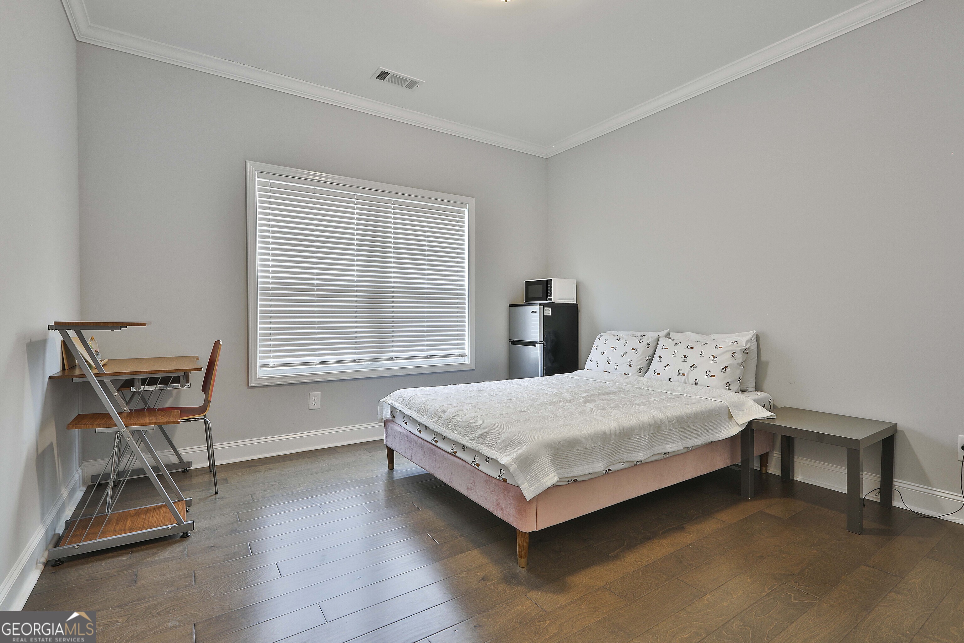 405 Lakeview Way LaGrange, GA 30241 - Photo 24 of 54 a bedroom with a bed chair and a window