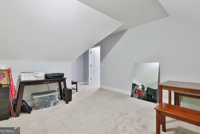 a view of a two chairs in the balcony