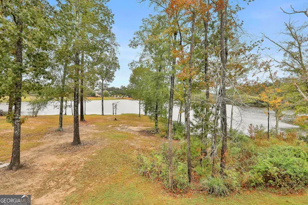 a bench sitting in front of a house