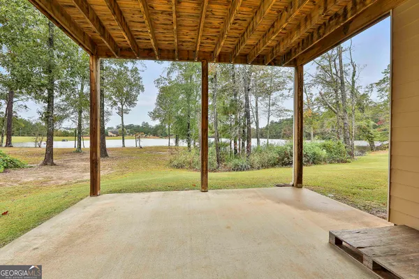 a view of an empty room with a garage