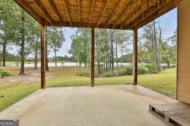 a view of an empty room with a garage