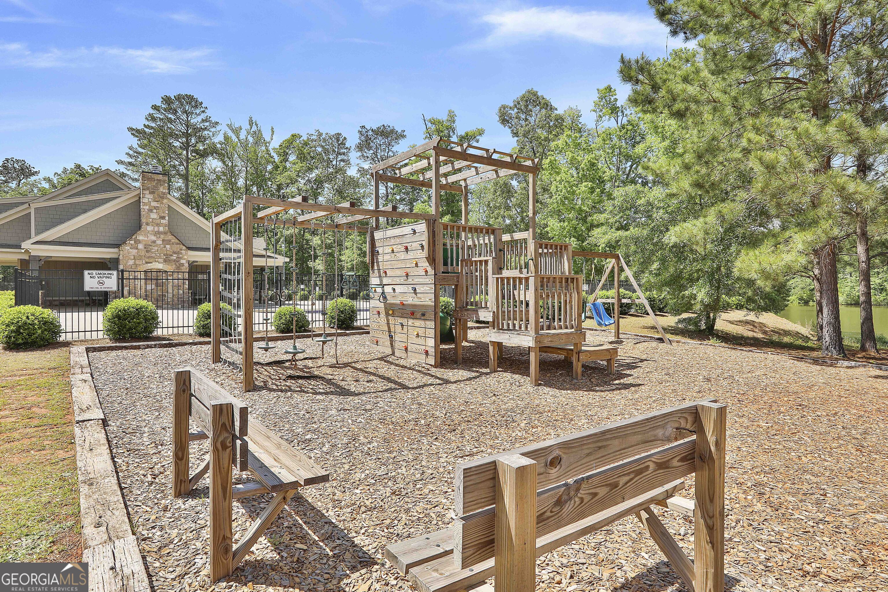 405 Lakeview Way LaGrange, GA 30241 - Photo 44 of 54 a view of a house with backyard and sitting area