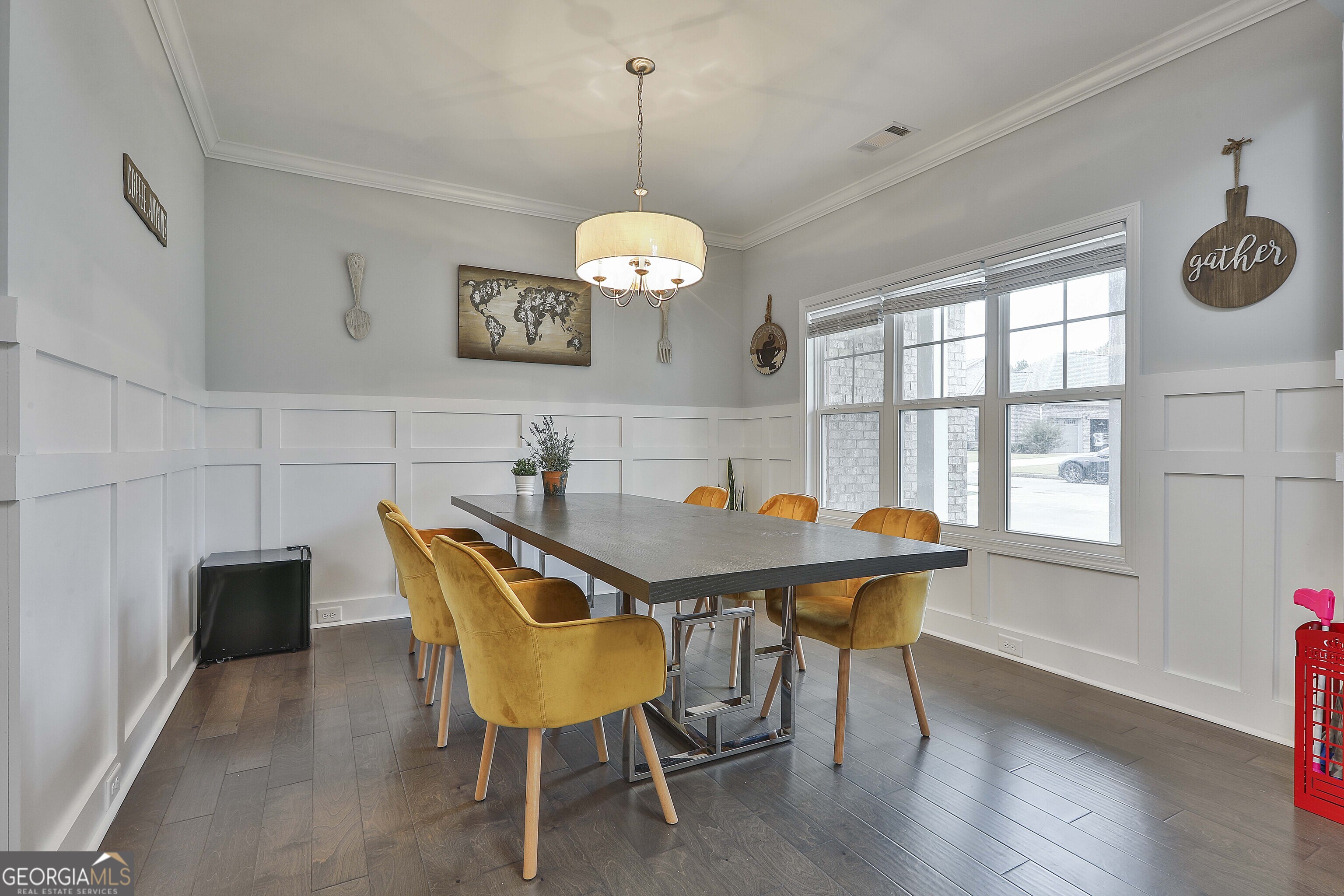 405 Lakeview Way LaGrange, GA 30241 - Photo 7 of 54 a dining room with furniture a chandelier and wooden floor