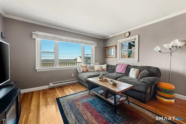 a living room with furniture and a window