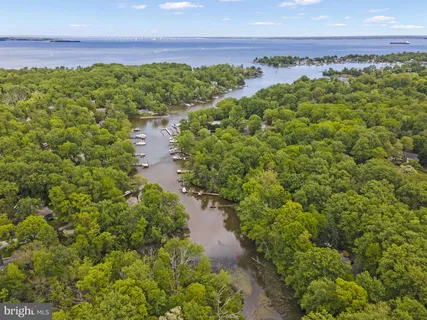 a view of a lake with a yard