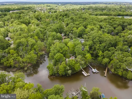 a view of a lake with a house