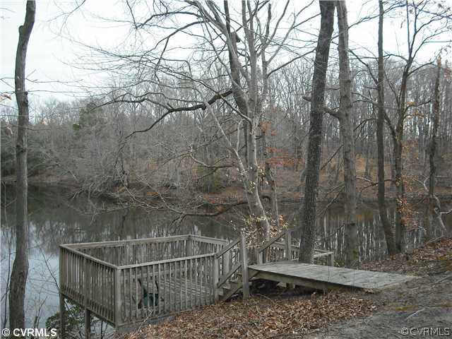 12867 West River Road Aylett, VA 23009 - Photo 2 of 19 Exterior Front - 48 acre Aylett Pond that connects