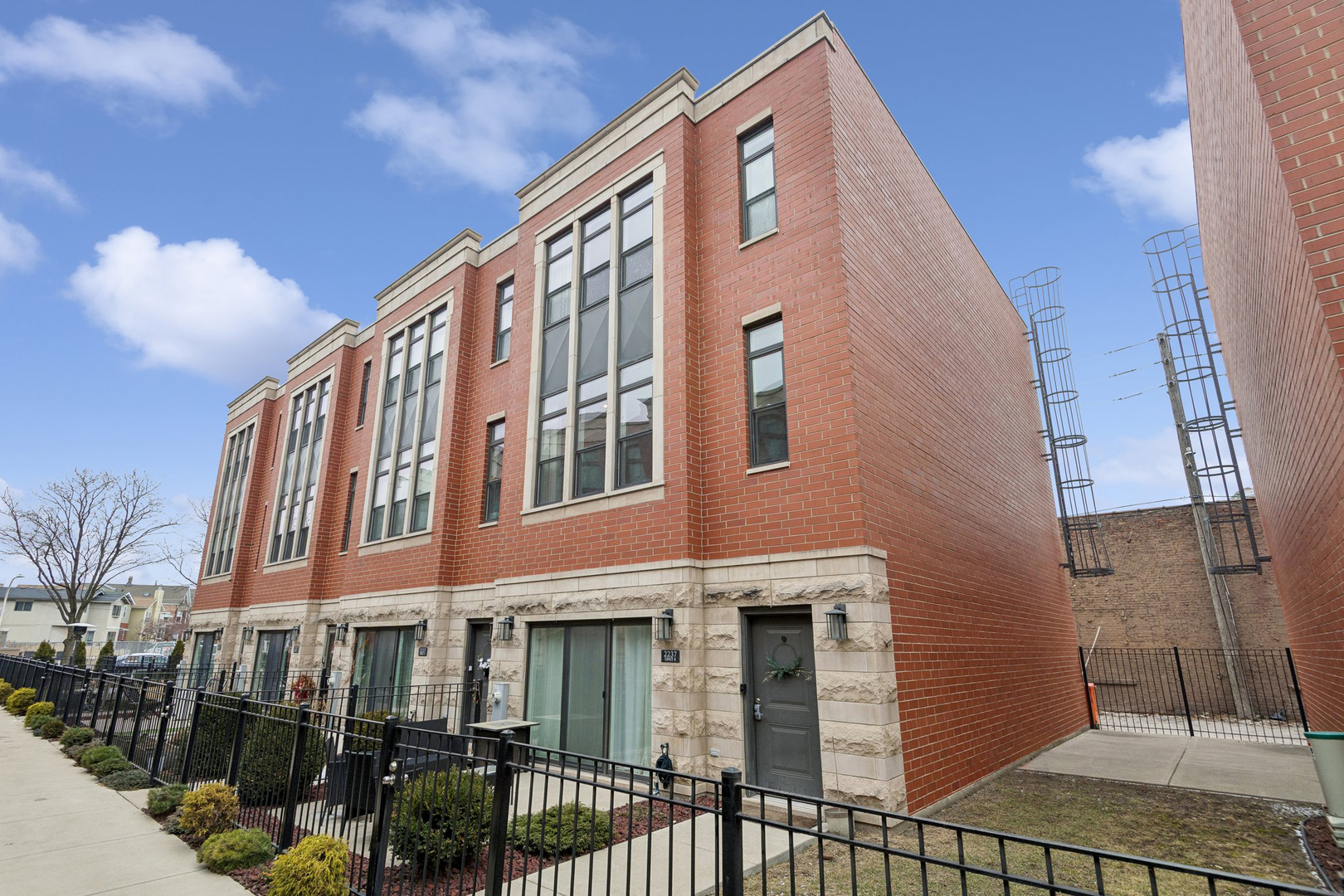a front view of a building with glass windows