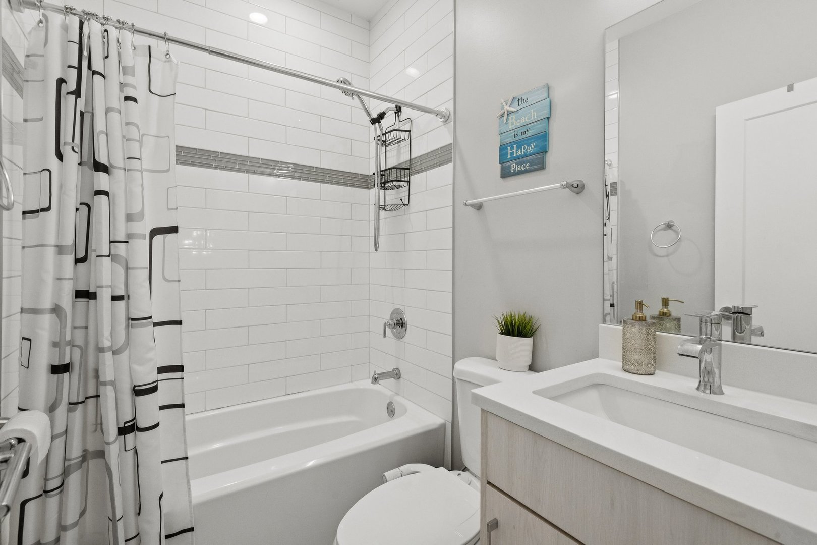 2237 West Coulter Street, Unit 4 Chicago, IL 60608 - Photo 16 of 26 a bathroom with a sink toilet and shower