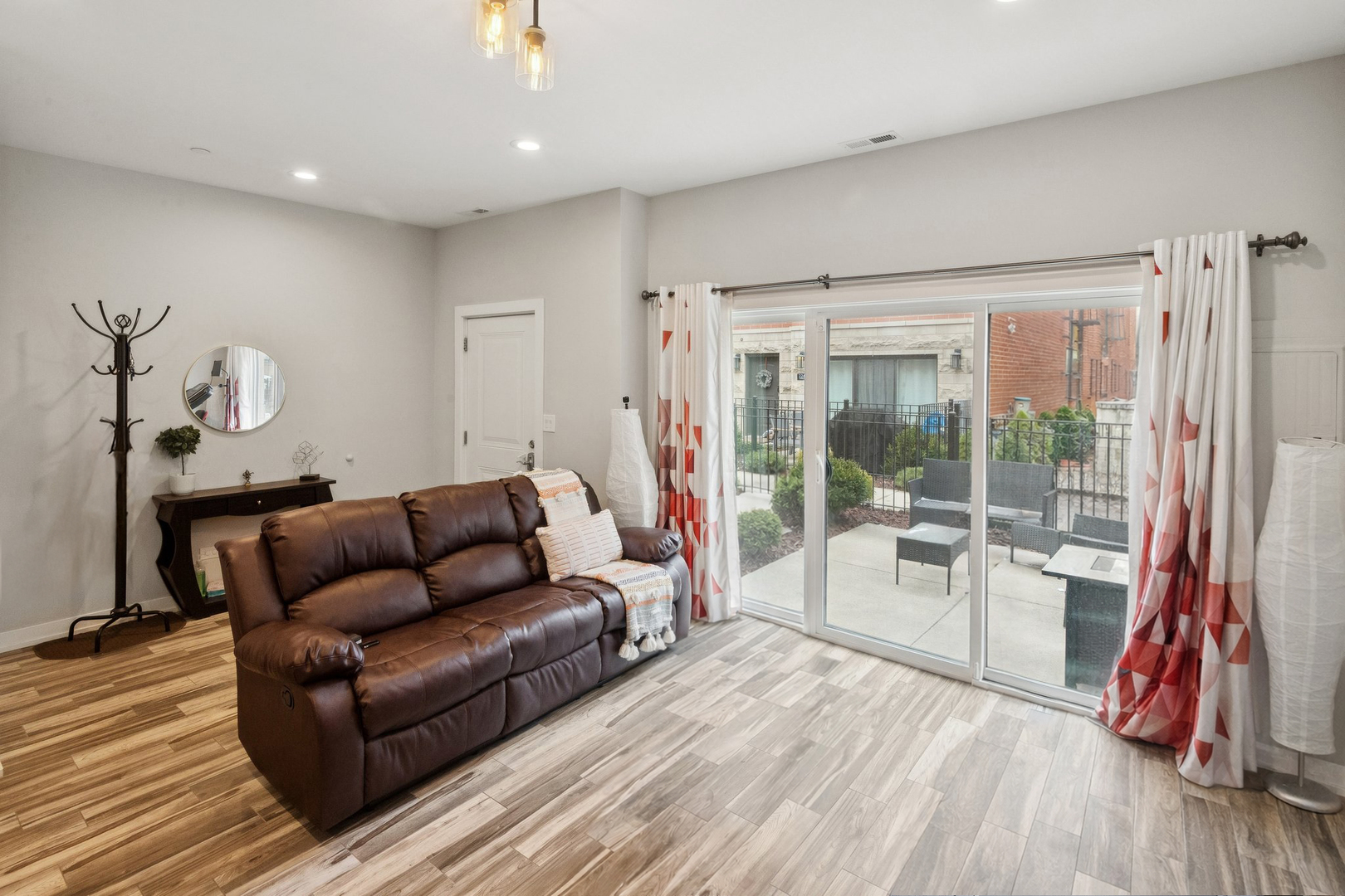 2237 West Coulter Street, Unit 4 Chicago, IL 60608 - Photo 19 of 26 a living room with furniture and a wooden floor