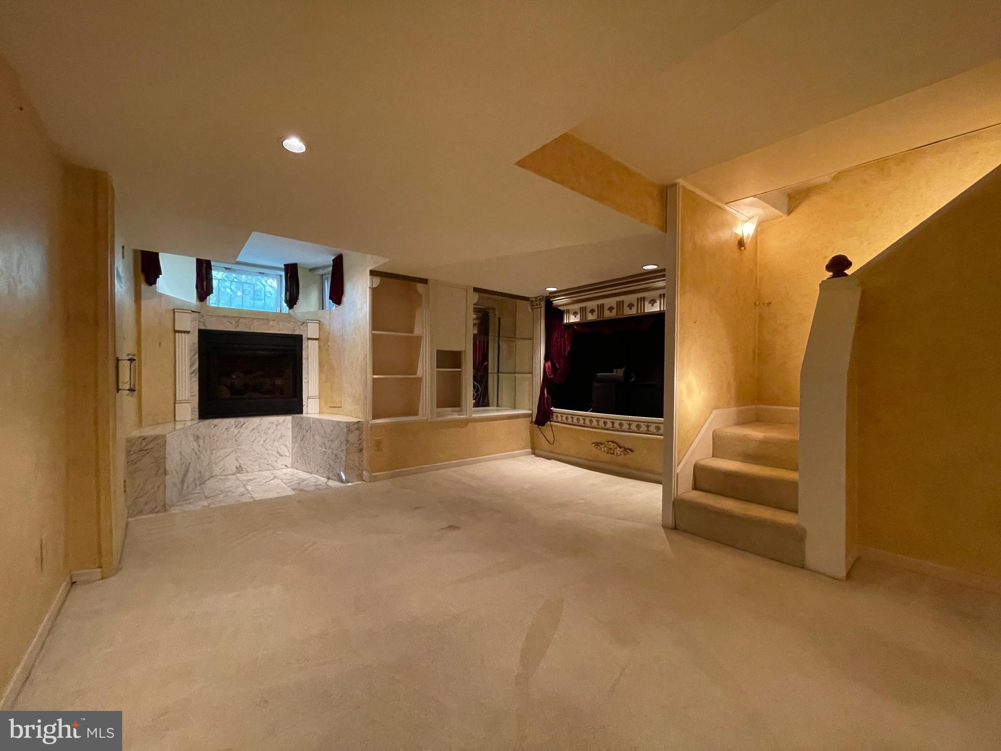 614 A Street Northeast Washington, DC 20002 - Photo 37 of 48 a view of a livingroom with an empty space and a fireplace