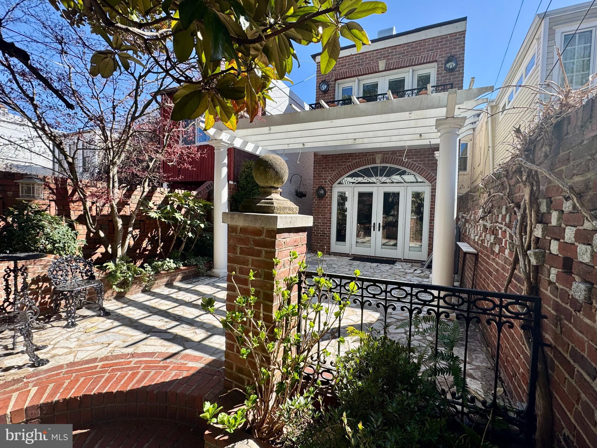 614 A Street Northeast Washington, DC 20002 - Photo 40 of 48 a front view of a house with a yard
