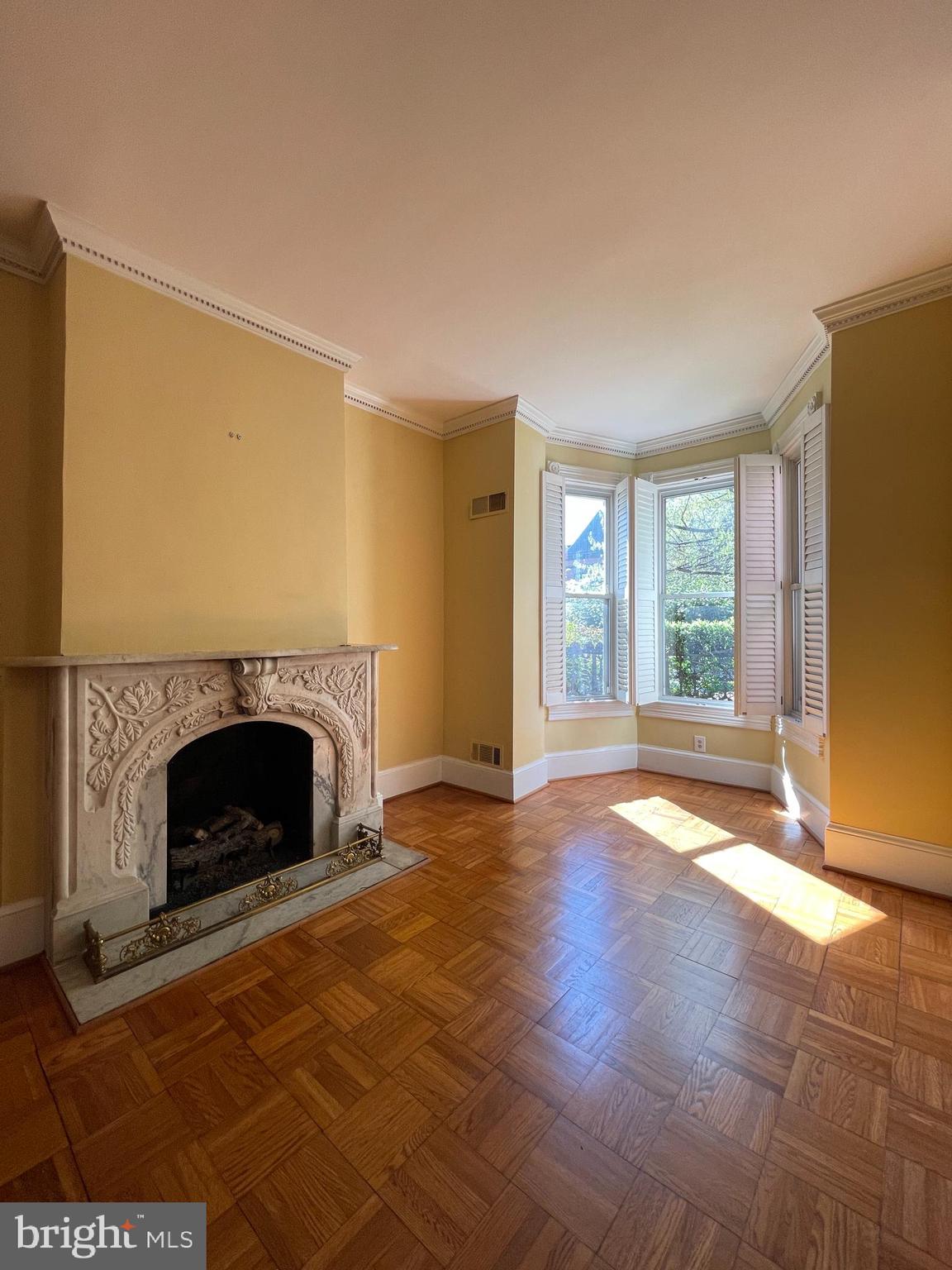 614 A Street Northeast Washington, DC 20002 - Photo 5 of 48 a view of empty room with wooden floor and fireplace