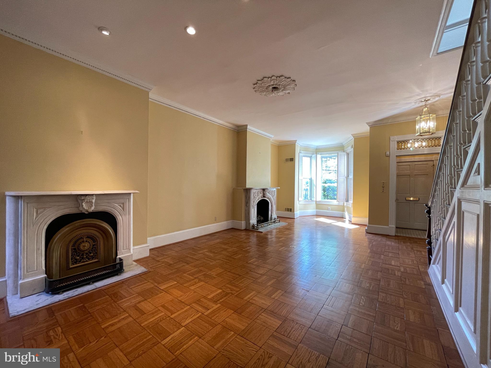 614 A Street Northeast Washington, DC 20002 - Photo 7 of 48 a view of a livingroom with a fireplace and wooden floor