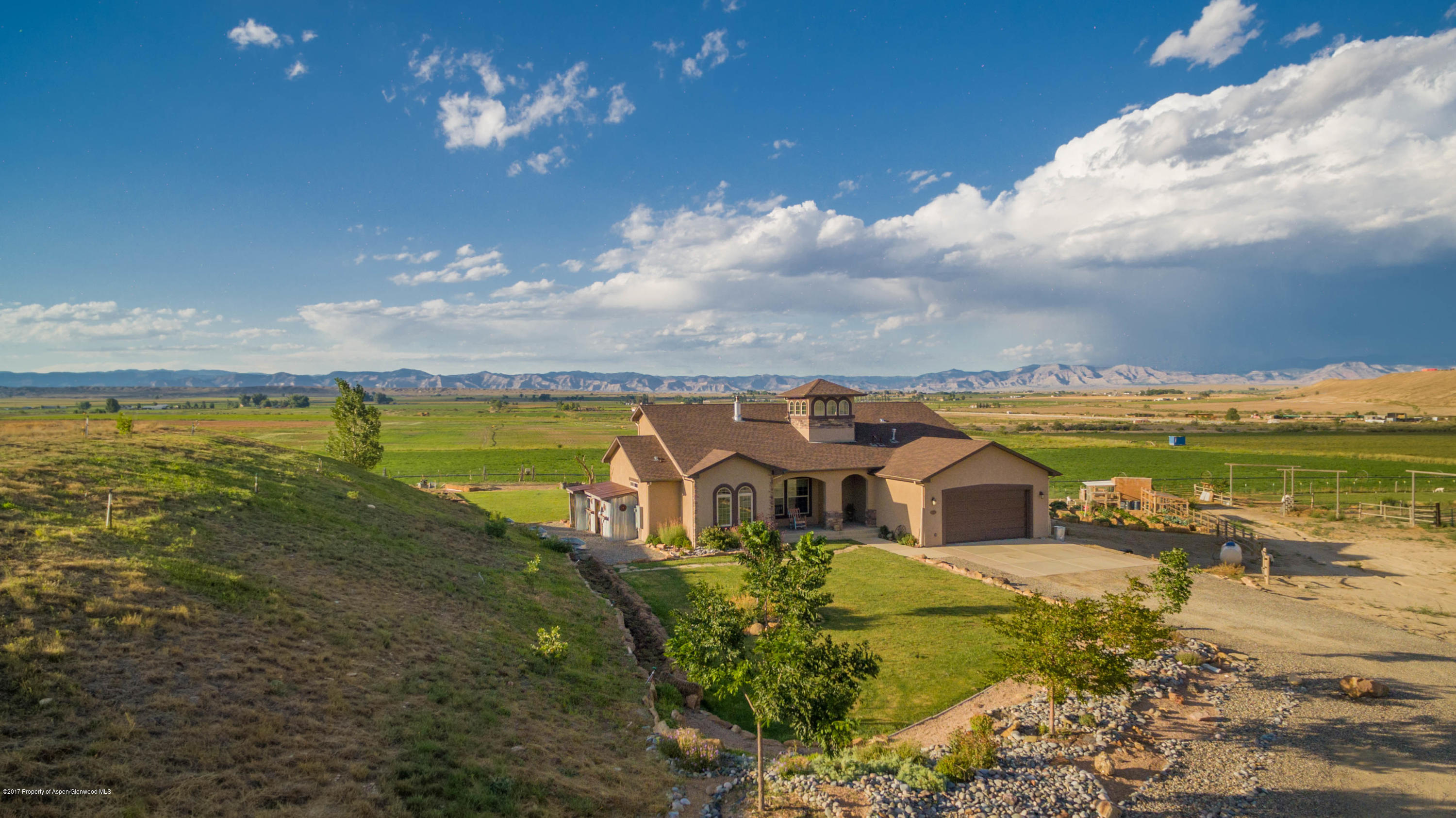 1690 8 Road Mack, CO 81525 - Photo 1 of 37 a view of a lake with a big yard