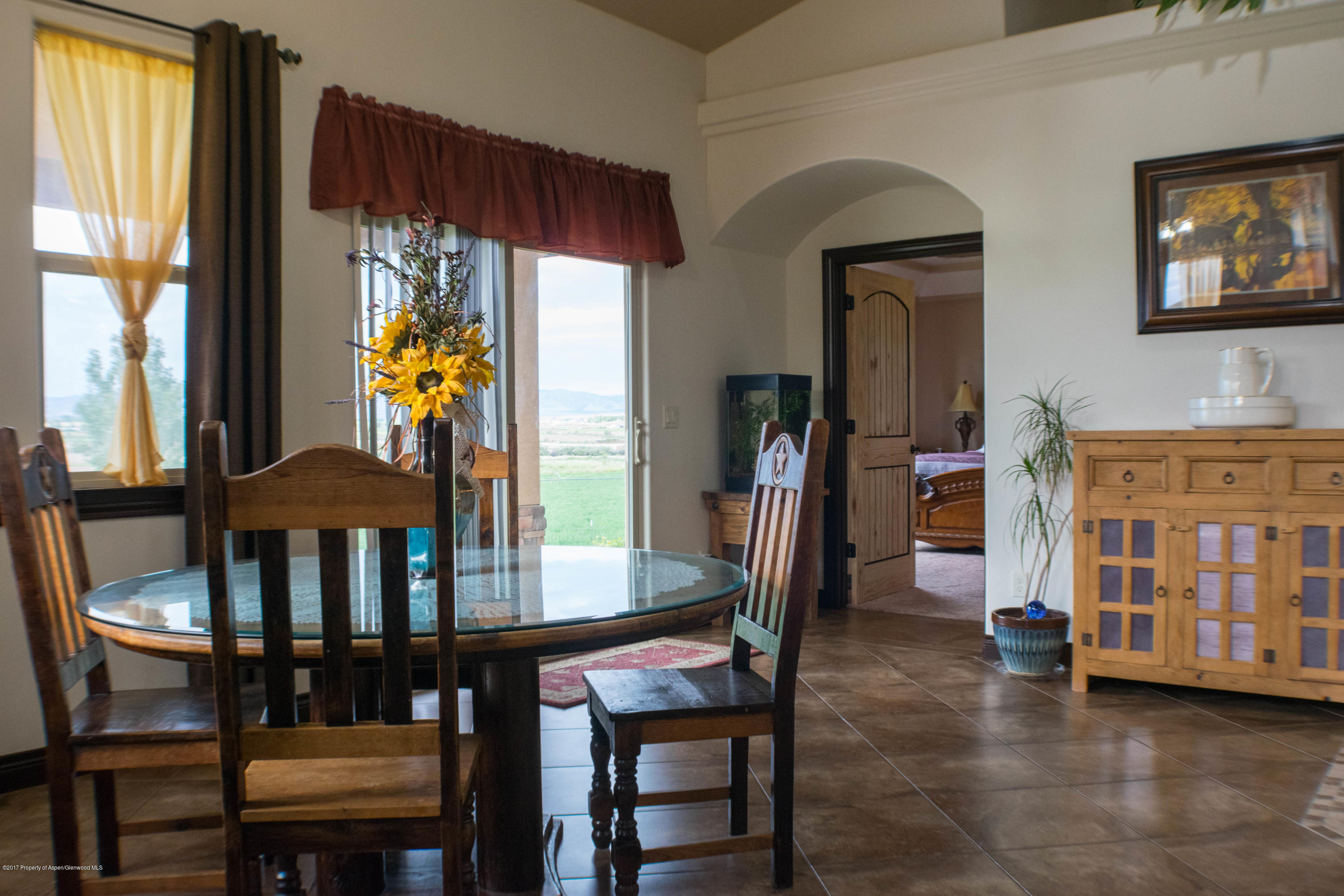 1690 8 Road Mack, CO 81525 - Photo 13 of 37 a dining room with furniture and window