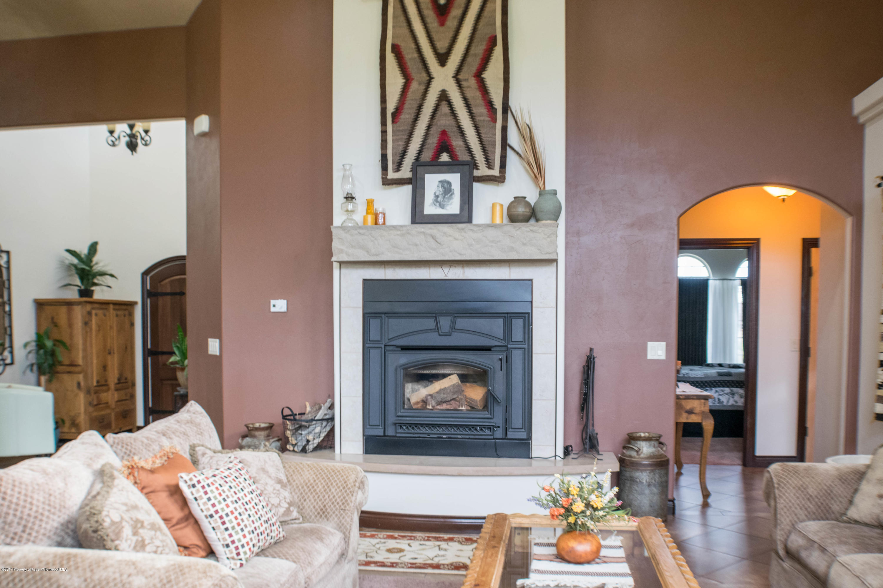 1690 8 Road Mack, CO 81525 - Photo 15 of 37 a living room with furniture and a fireplace
