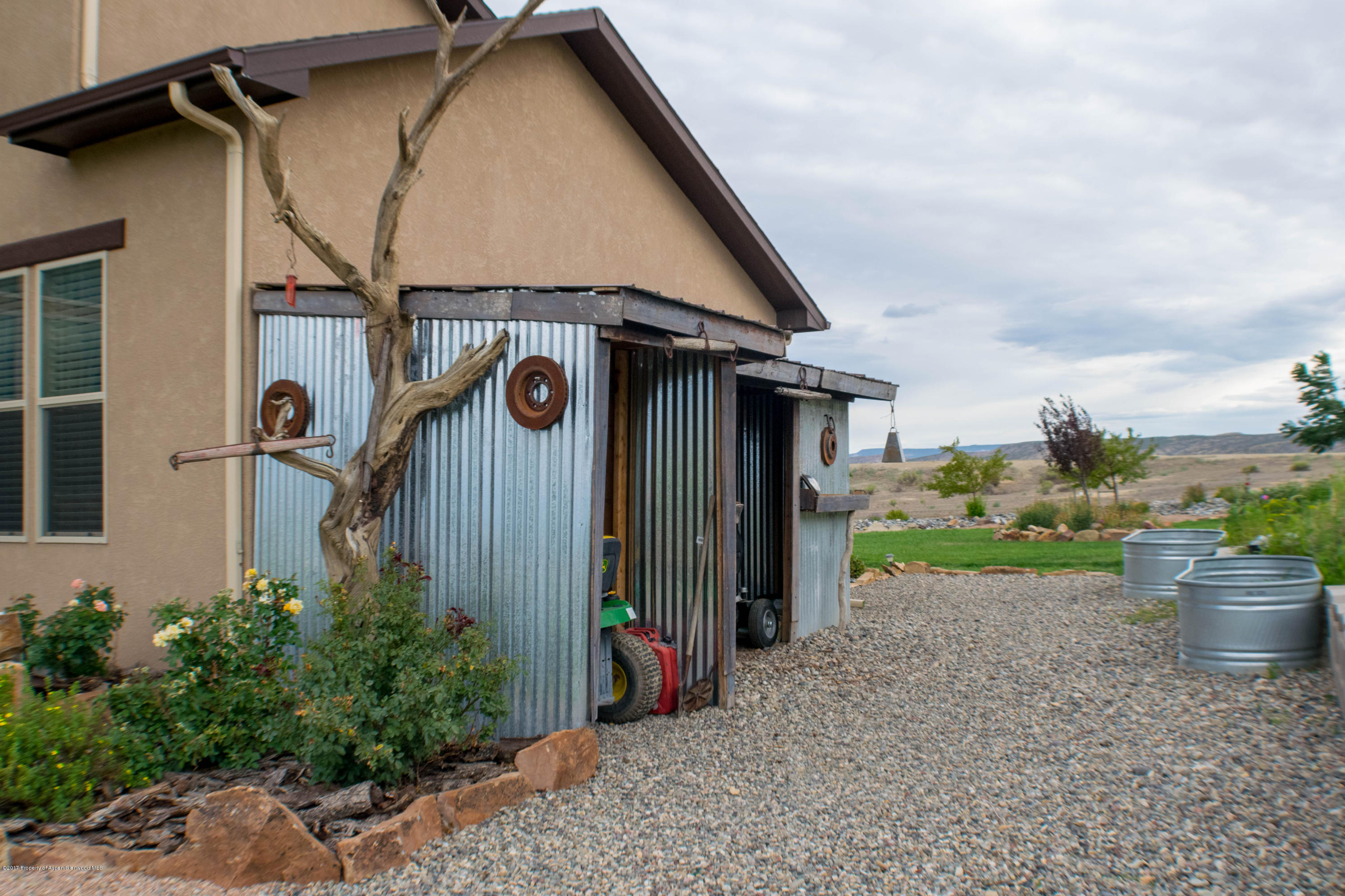 1690 8 Road Mack, CO 81525 - Photo 28 of 37 a view of a house with wooden walls