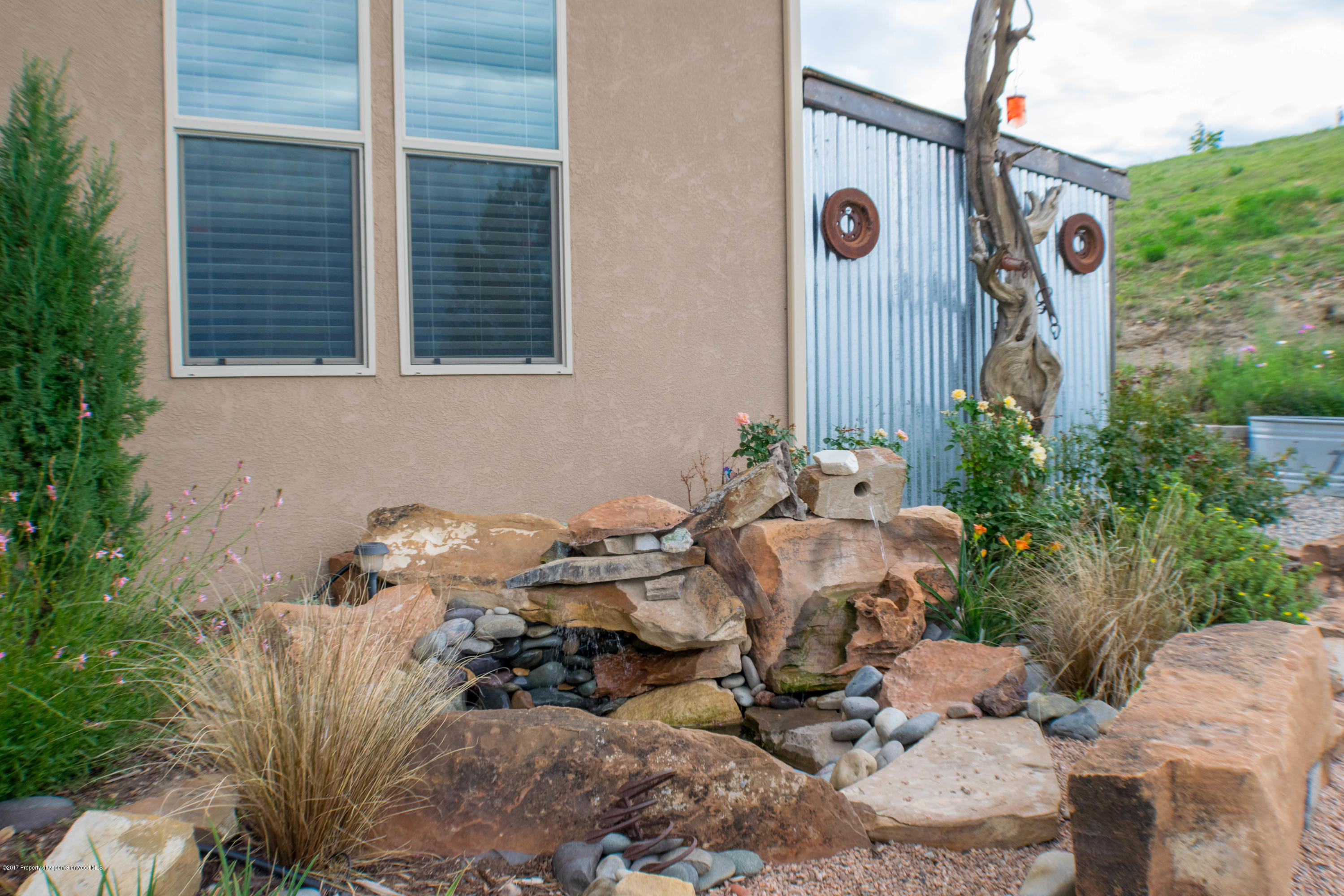 1690 8 Road Mack, CO 81525 - Photo 29 of 37 a front view of a house with patio