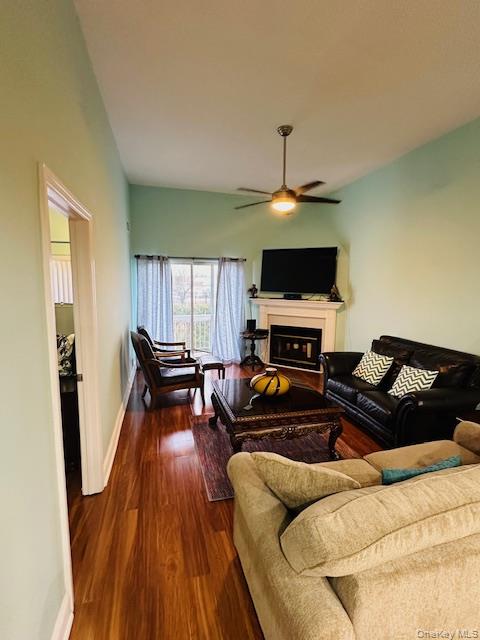 190 Schofield Street, Unit 2E Bronx, NY 10464 - Photo 17 of 24 a living room with furniture and a flat screen tv