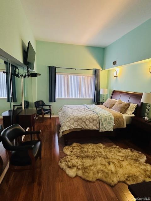 190 Schofield Street, Unit 2E Bronx, NY 10464 - Photo 18 of 24 a bedroom with a bed window and couch