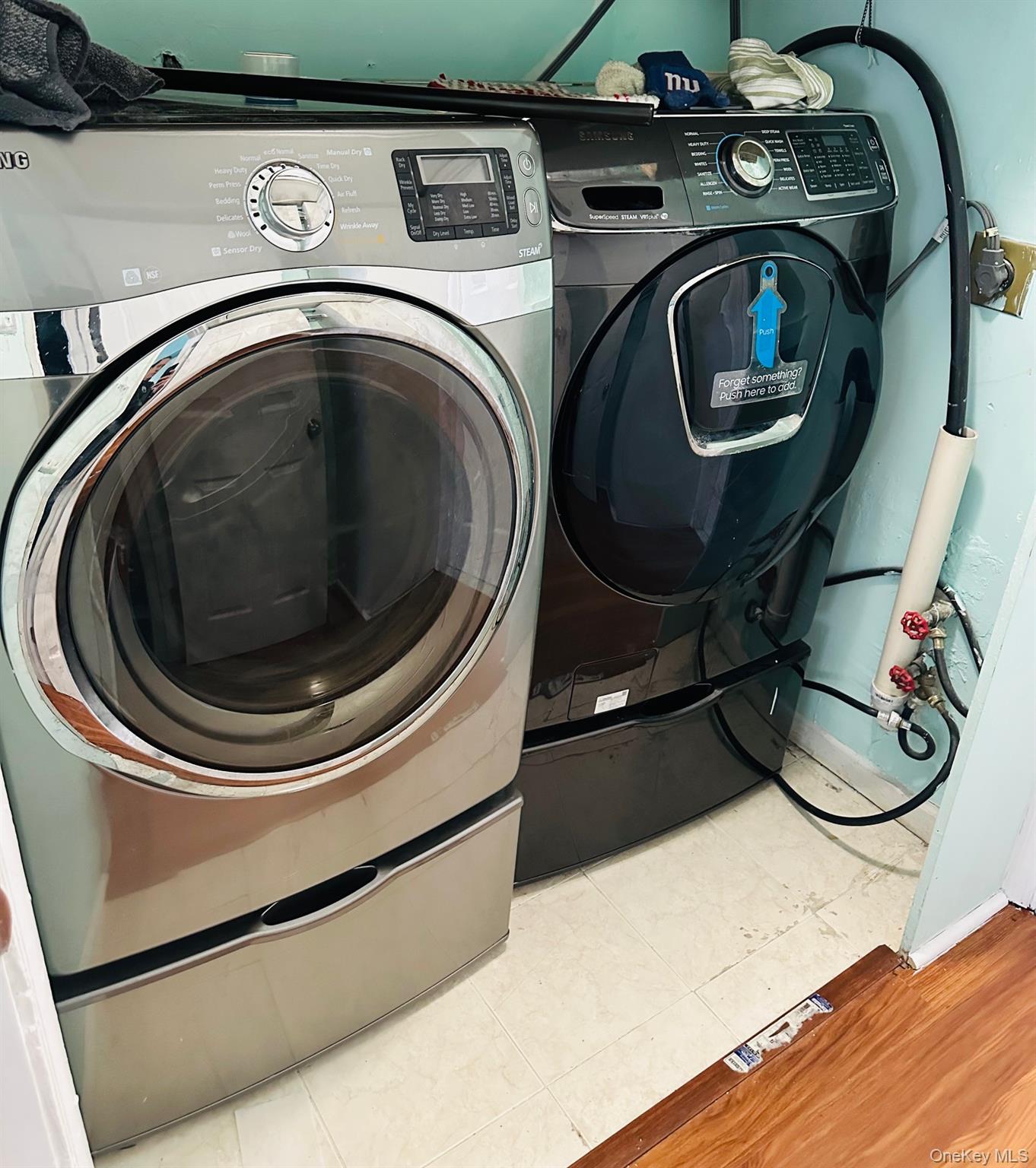 190 Schofield Street, Unit 2E Bronx, NY 10464 - Photo 23 of 24 a utility room with dryer and washer