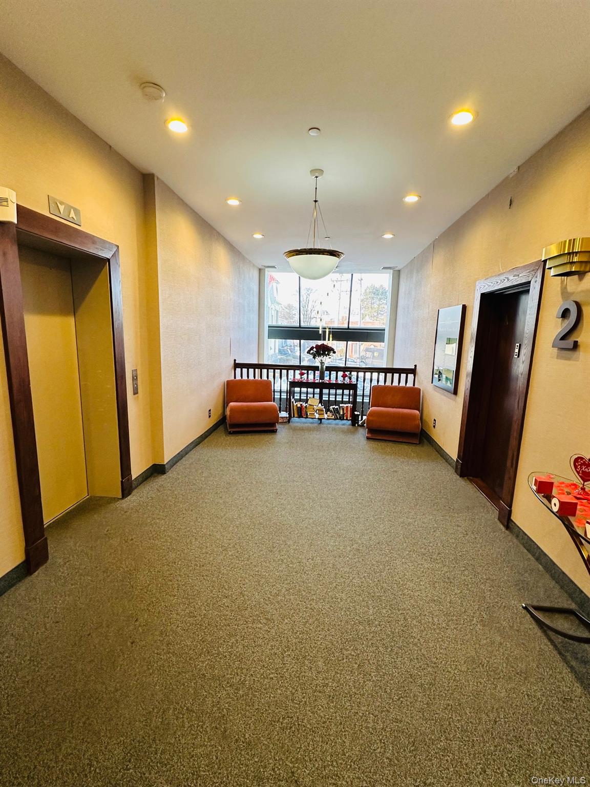 190 Schofield Street, Unit 2E Bronx, NY 10464 - Photo 4 of 24 a view of a room with furniture and a refrigerator