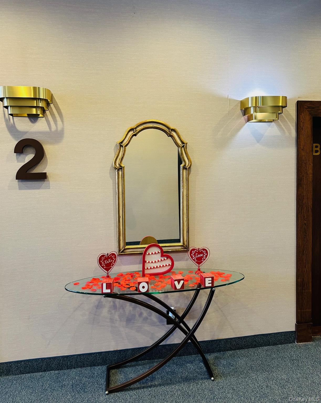 190 Schofield Street, Unit 2E Bronx, NY 10464 - Photo 10 of 24 a room with a table and gym equipment