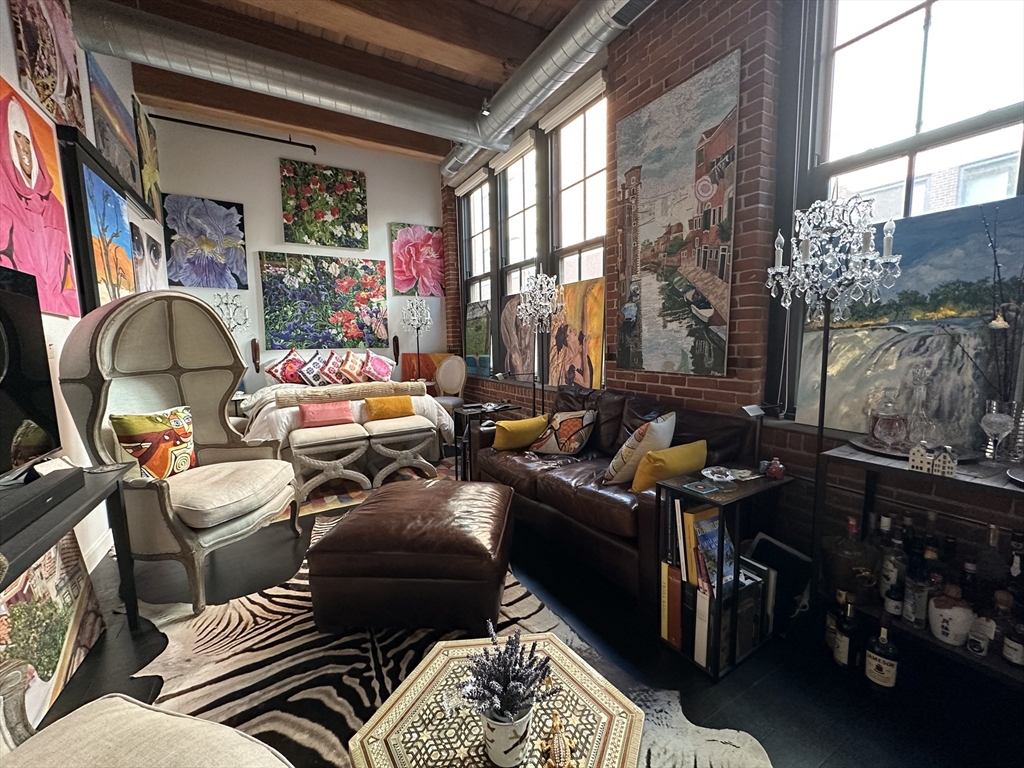 319 A Street, Unit 305 Boston, MA 02210 - Photo 2 of 11 a room with furniture