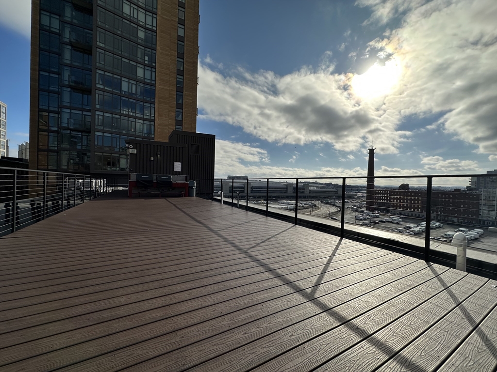 319 A Street, Unit 305 Boston, MA 02210 - Photo 9 of 11 a view of terrace with wooden floor
