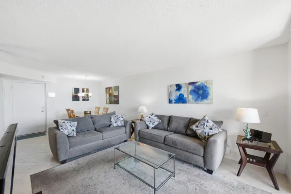 a living room with furniture and a couch