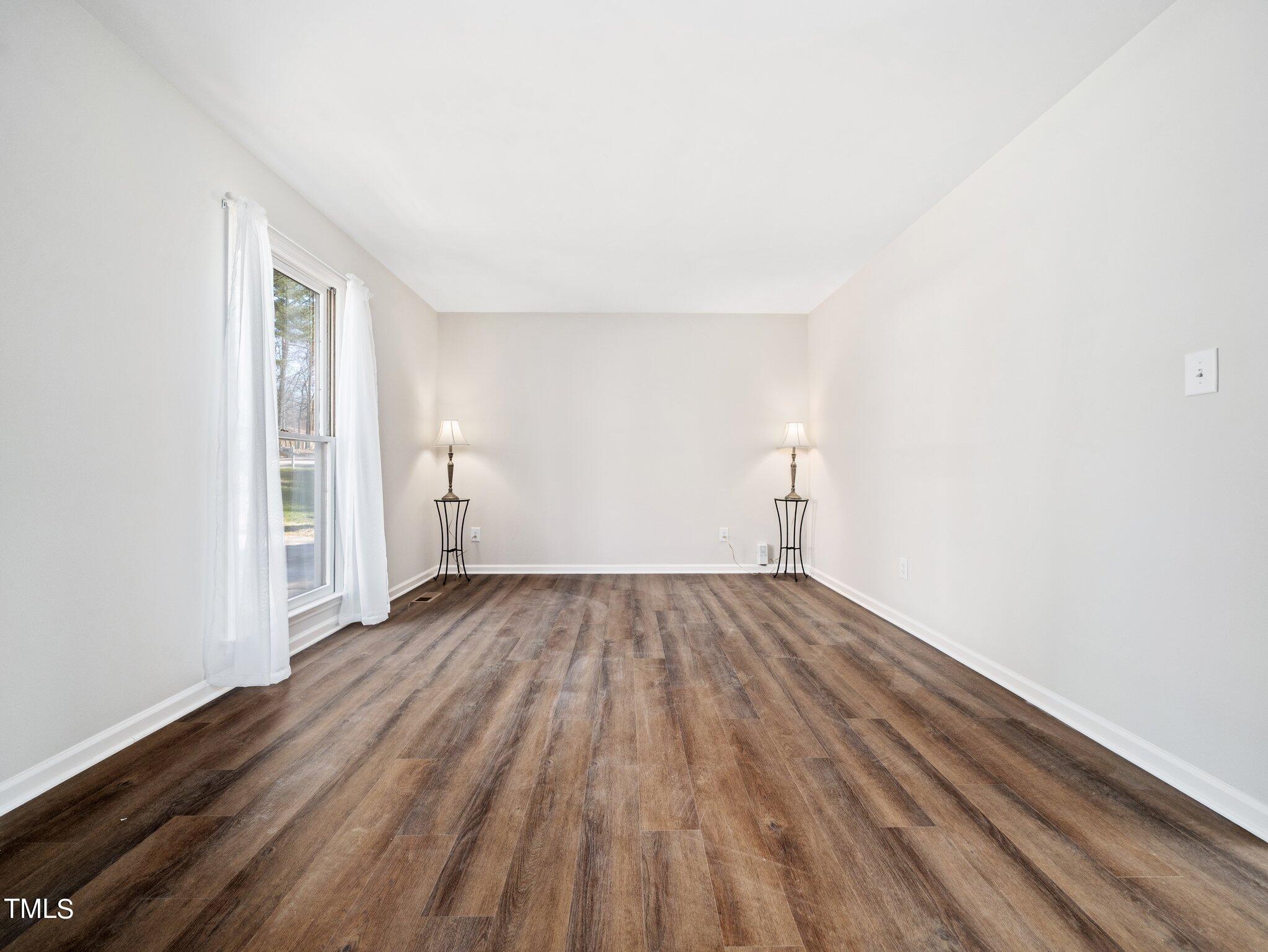 3512 Donna Road Raleigh, NC 27604 - Photo 8 of 28 wooden floor in an empty room