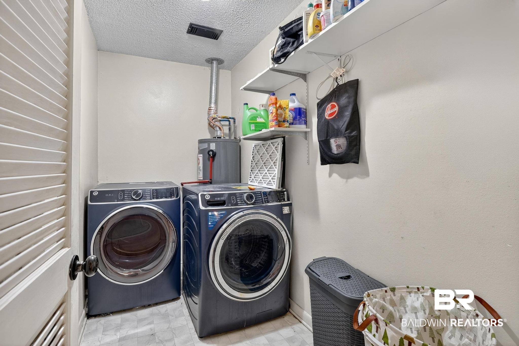 21895 2nd Street Silverhill, AL 36576 - Photo 40 of 43 Washroom featuring gas water heater