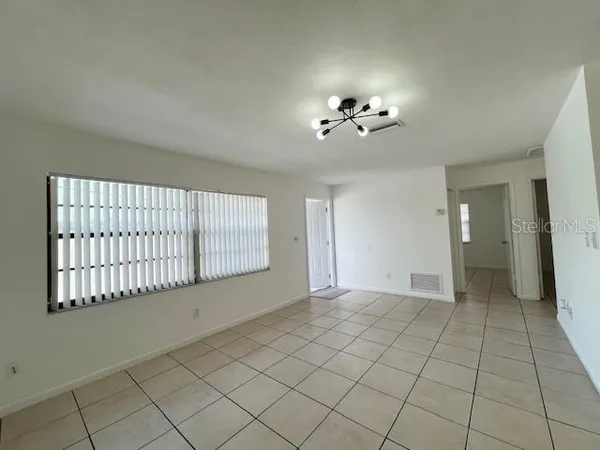 a kitchen with a cabinets and a stove top oven