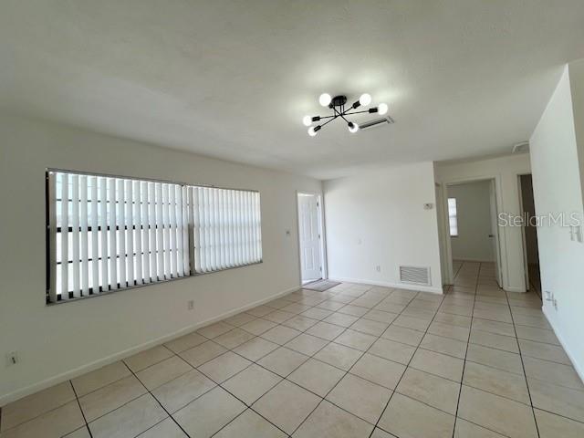 1902 Northeast 17th Place Ocala, FL 34470 - Photo 12 of 28 a view of an empty room with a window