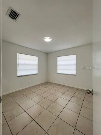 a view of a kitchen from the hallway