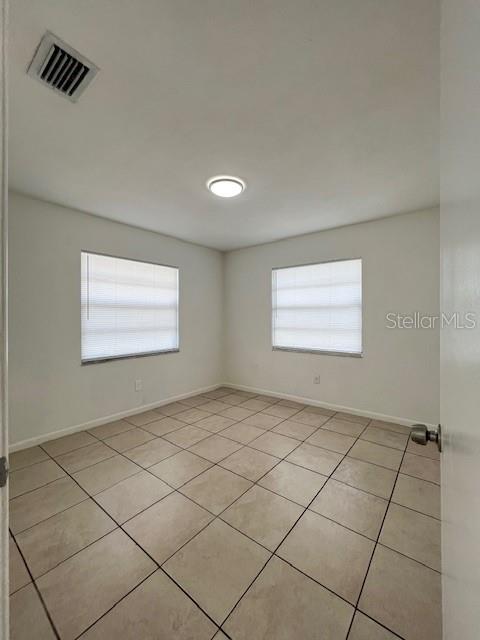 1902 Northeast 17th Place Ocala, FL 34470 - Photo 19 of 28 a view of an empty room and window