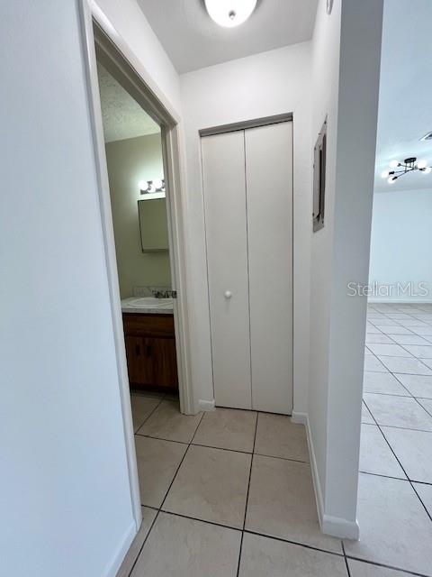 1902 Northeast 17th Place Ocala, FL 34470 - Photo 23 of 28 a view of a kitchen from the hallway